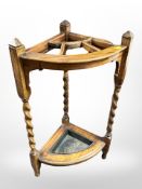 An Edwardian oak barley twist umbrella stand,