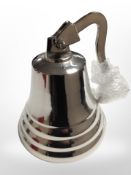 A cast-metal ship's-style bell, height 20cm.