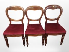 Three Victorian mahogany balloon backed chairs