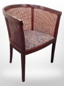 A contemporary bergere armchair,