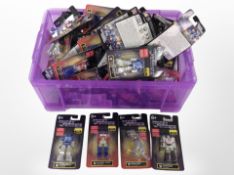 A box of Hasbro Transformers miniature figurines.