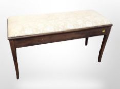 An early 20th century mahogany duet stool