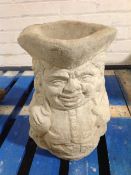 A concrete Toby jug planter, height 42cm.