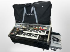 A Technics PCM Sound C600 with flight case and stand together with a Philips DVD player