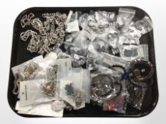A group of modern costume jewellery including band rings, heavy chain necklaces, silver necklace,