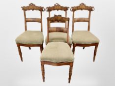 A set of three 19th century carved mahogany dining chairs plus another similar