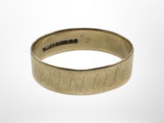 A 9ct gold band ring, size Q CONDITION REPORT: 1.