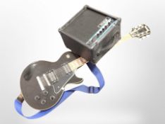 A Rockwood by Hohner electric guitar, and a shine amplifier with lead.