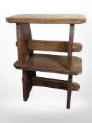 A pair of oak refectory stools,