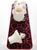 A contemporary floor mat and several table lamps with shades, including a Mason's example.