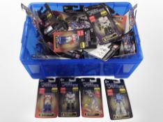 A box of Hasbro Transformers miniature figurines.