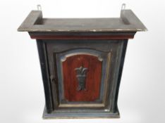 A 19th-century Scandinavian painted pine single-door wall cupboard, height 52cm.