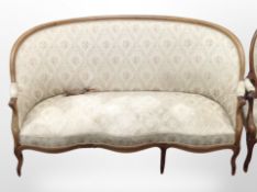 A 19th century continental carved walnut three seater salon settee,