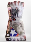 Two Marvel Select figurines, the Winter Soldier and Black Widow, boxed.