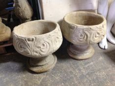 A pair of classical-style concrete garden planters, height 40cm.