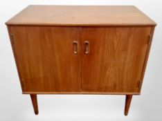 A Danish teak double door low side cabinet,