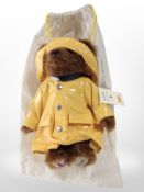 A Steiff RNLI teddy bear with tags and protective cloth bag.