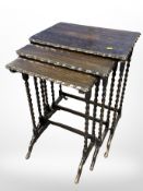 A nest of three barley twist oak tables,