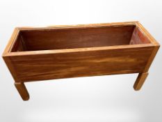 A Danish teak planter,