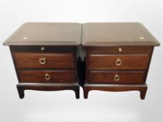 A pair of Stag three drawer bedside chests,