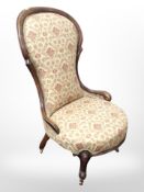 A Victorian carved walnut lady's chair