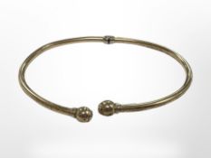 A 9ct gold torque bangle CONDITION REPORT: 4.4g.