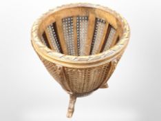 A carved beech bergere jardiniere,