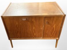 A Danish teak veneered low entertainment cabinet,