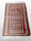 A Bokhara prayer rug, Afghanistan, 174cm x 97cm.