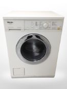 A Miele Novotronic washing machine.