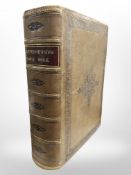 A Victorian leather-bound comprehensive family Bible containing monochrome engraved plates,