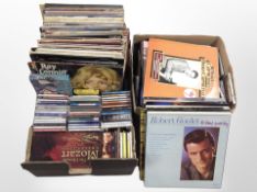 Two boxes containing vinyl LPs and CDs, mixed genres including classical,