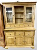 A contemporary oak dresser, 143cm wide x 45cm deep x 201cm high.