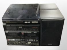 A Technics stereo double-cassette receiver SA-X22WRL, a further turntable, and a pair of speakers.