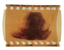 A vintage 35mm Kodak negative of Elvis Presley on June 26th 1977 in performance on his final show