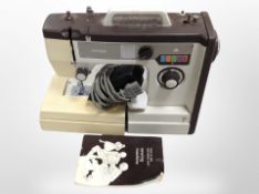 A Jones electric sewing machine with lead and pedal.