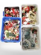 Four boxes of Christmas decorations.