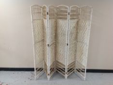 A wicker six-panel screen, each panel 170cm x 40cm.