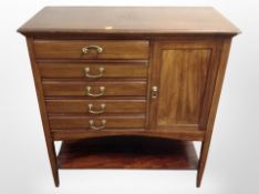 An Edwardian mahogany music cabinet, 80cm wide x 38cm deep x 84cm high.