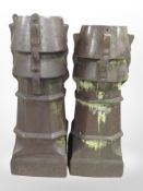 A group of four Victorian terracotta chimney caps, tallest 99cm.