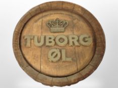 A ceramic Tuborg circular wall plaque, diameter 39cm.