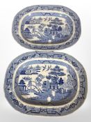 A pair of 19th-century Staffordshire blue and white willow pattern meat plates, width 40cm.