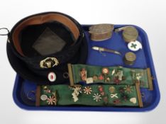 Two Danish felt sashes holding a quantity of enamel pin badges, together with a cap,
