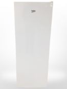 A Beko upright fridge.