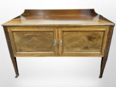 A late Victorian mahogany and satinwood-banded double-door cabinet,