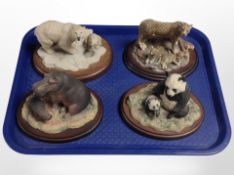 Four Border Fine Arts endangered species figure groups.