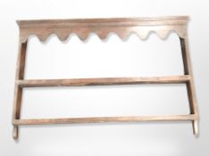 A George III oak plate rack,