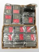 Two boxes of Love Forever artificial roses and gift bags