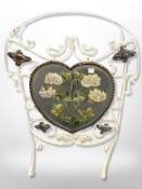 An Art Nouveau painted metal mirrored fire screen,