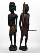 Two African carved wooden figures, tallest 61cm.
